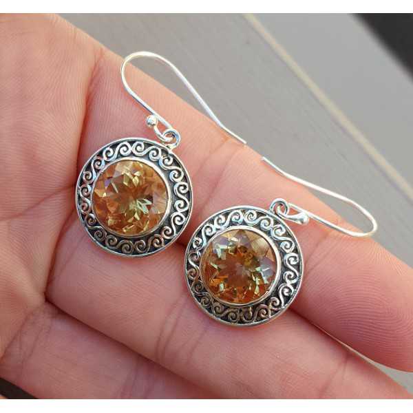 Silver earrings set with round Citrine