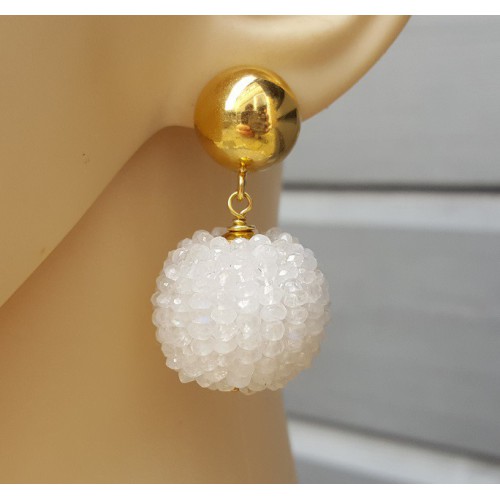 Earrings set with large ball of rainbow moonstones