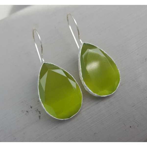 Silver earrings with large oval green cats eye