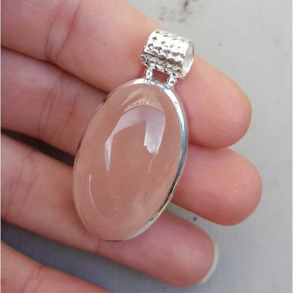 Silver pendant set with oval cabochon rose quartz