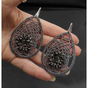 Earrings with grey pendant of silk thread and crystals