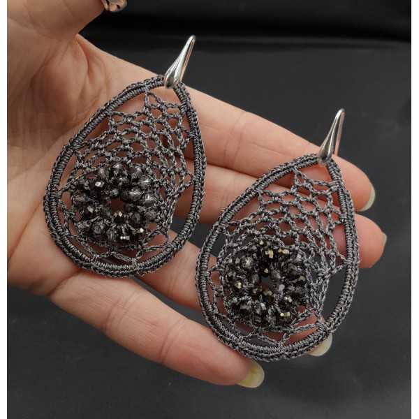 Earrings with grey pendant of silk thread and crystals