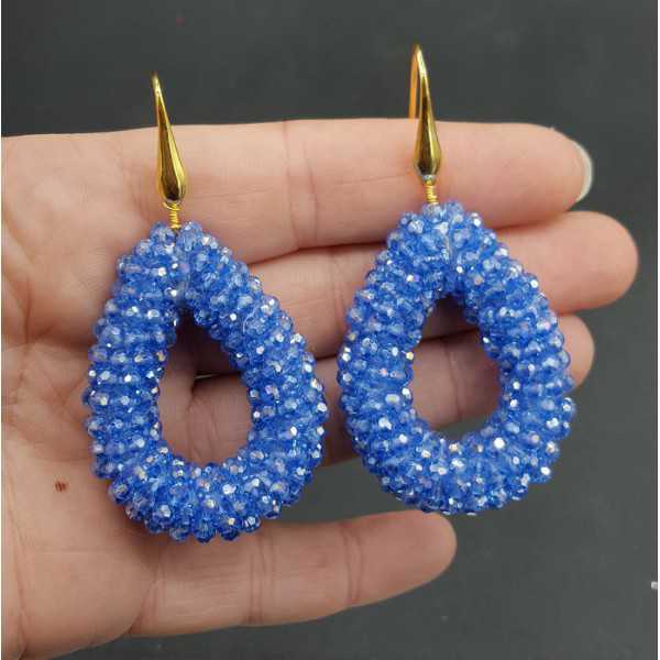 Gold plated earrings with open drop light blue sparkling crystals
