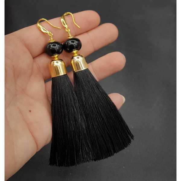 Vergoldete Ohrringe mit schwarzer Quaste und Onyx
