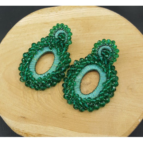 Earrings with pendant of transparent green silk wire and crystals