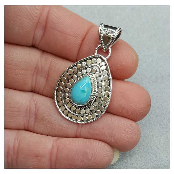 Silver pendant set with teardrop Turquoise