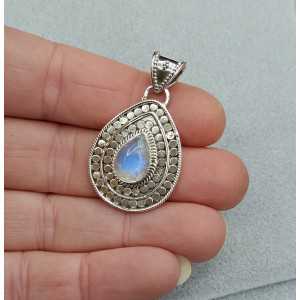 Silver pendant set with oval rainbow Moonstone