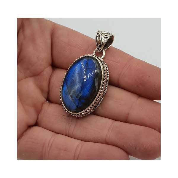 Silver pendant oval Labradorite set in a carved setting