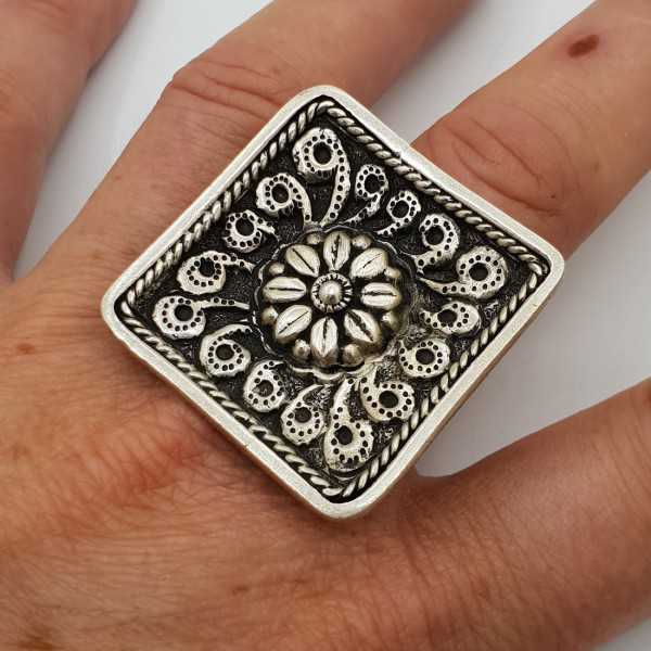 Silver ring with large square carved head adjustable