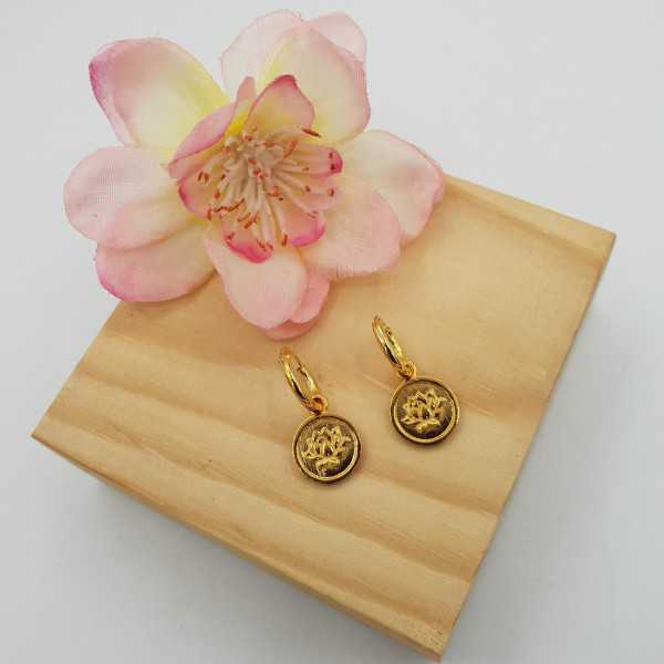 Gold-plated creoles with circular pendant with lotus