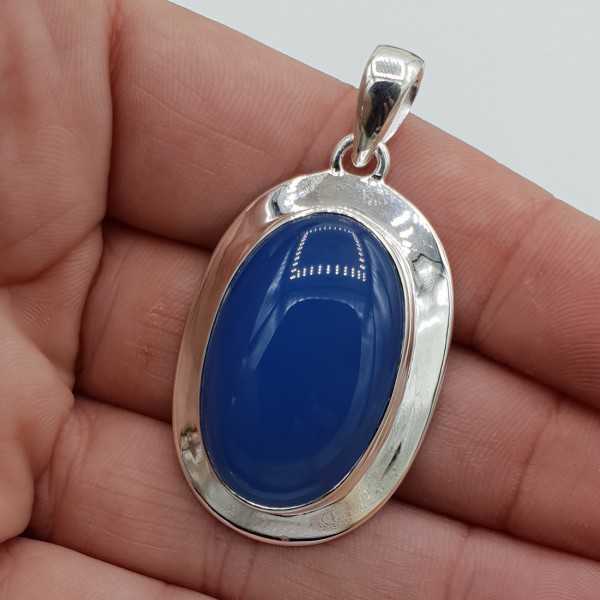 Silver pendant oval shaped blue Chalcedony in a tight setting