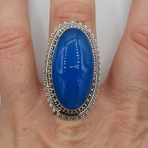 Silver ring with blue Chalcedony and carved head 19 mm