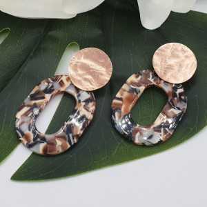 Earrings with beige brown black resin pendant