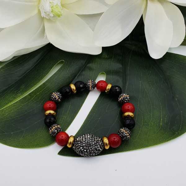 Bracelet of black Onyx Coral and crystals