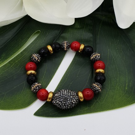 Bracelet of black Onyx Coral and crystals