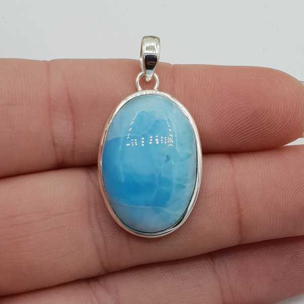 Silver pendant set with oval cabochon Larimar