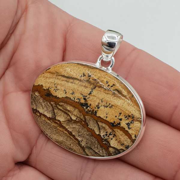 Silver pendant set with traverse oval landscape Jasper