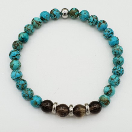 Bracelet with Smokey Topaz and blue Howliet