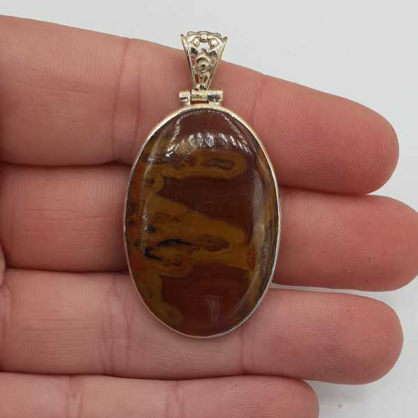 Silver pendant set with Seam Agate