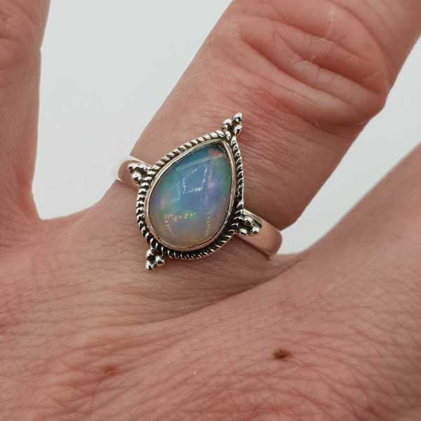 Silver ring set with oval Ethiopian Opal 16.5 mm