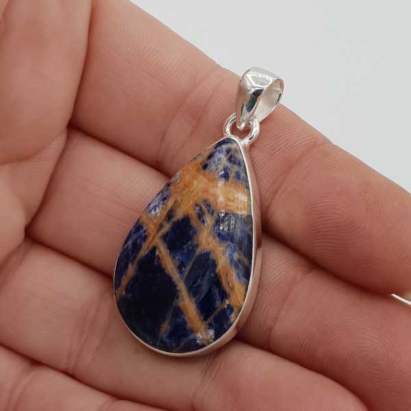 Silver pendant set with teardrop shaped orange Sodalite