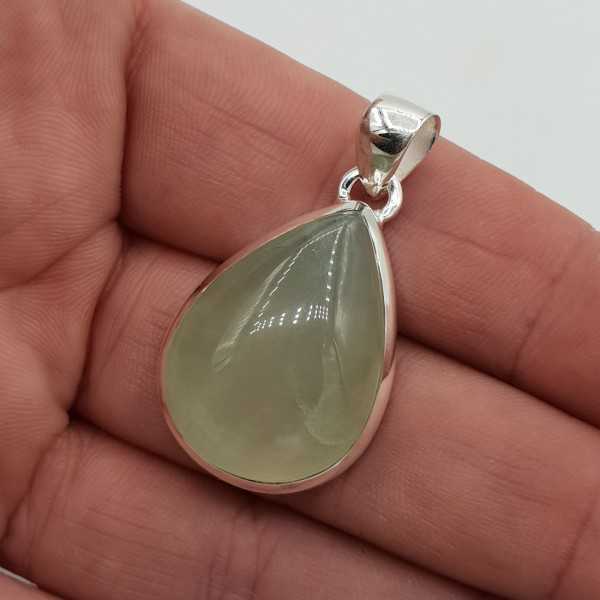 Silver pendant with drop-shaped cabochon cut its color