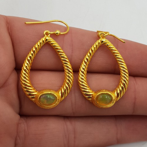 Gilded earrings with...