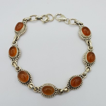 Silver bracelet set with carneool