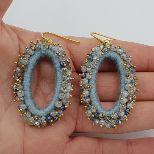 Gilded glassberry earrings oval light blue