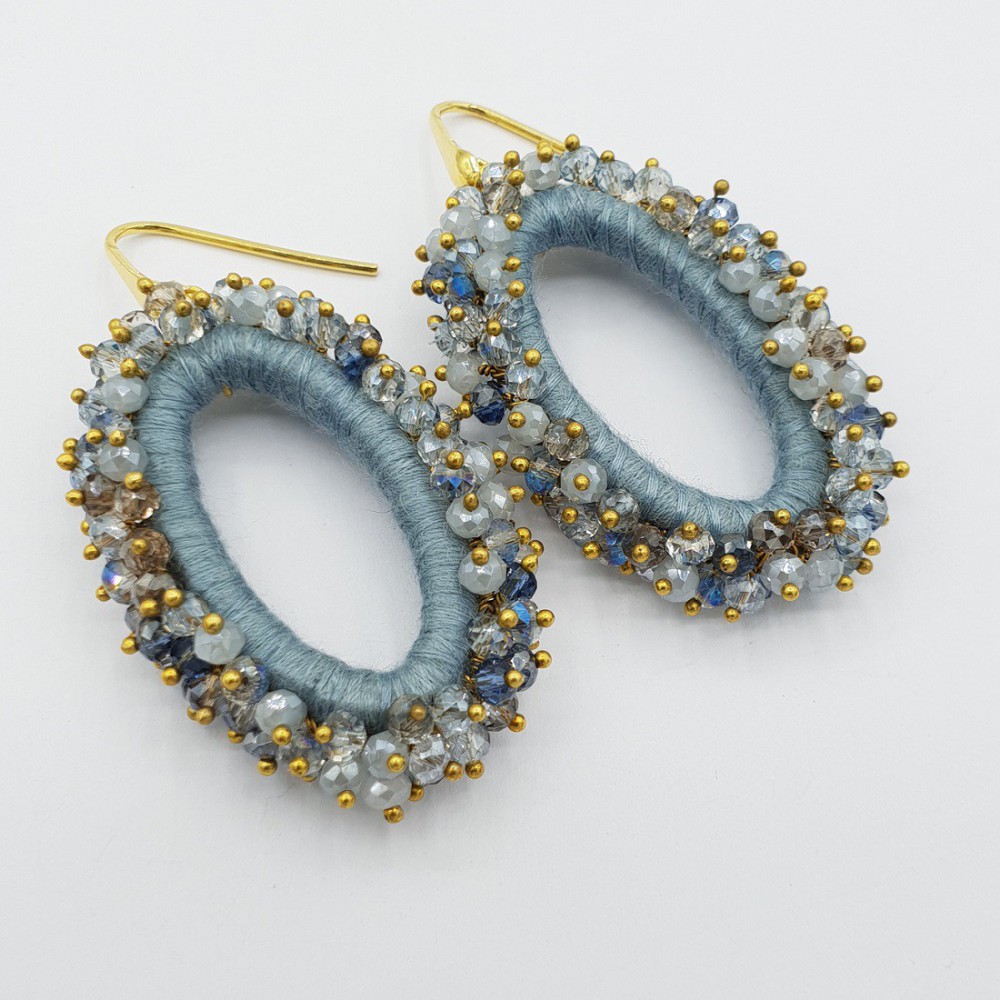 Gilded glassberry earrings oval light blue