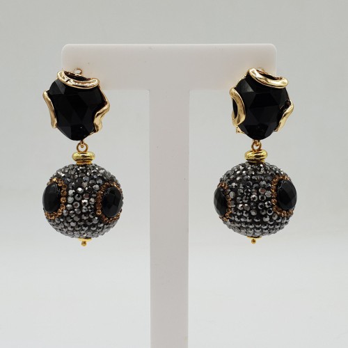 Gilded earrings full of...