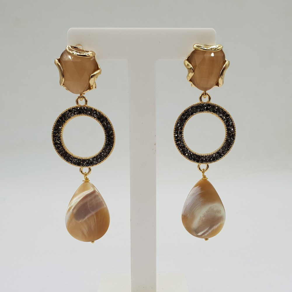 Gilded earrings with cat eye and mother -of -pearl