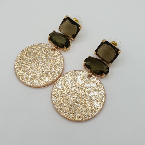 Gilded earrings with resin...