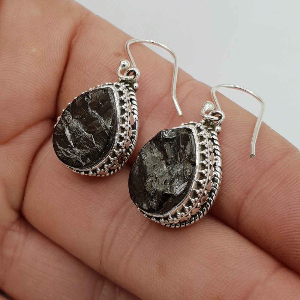 Silver earrings drop -shaped shungite put in edited setting