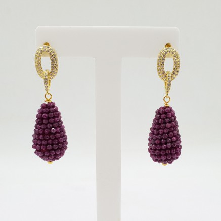 Gilded earrings with a drop of rubies