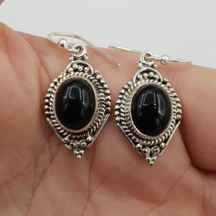 925 sterling silver earrings set with oval black onyx