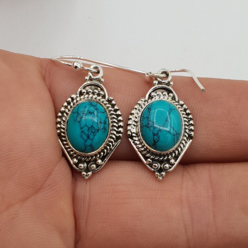 925 Sterling silver earrings set with oval turquoise