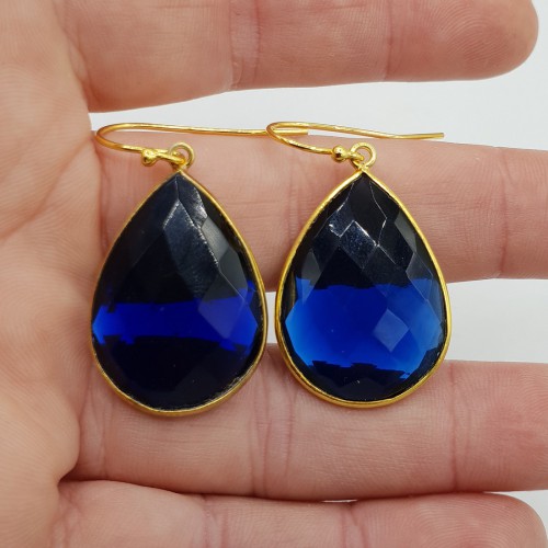 Gilded earrings with sapphire blue quartz