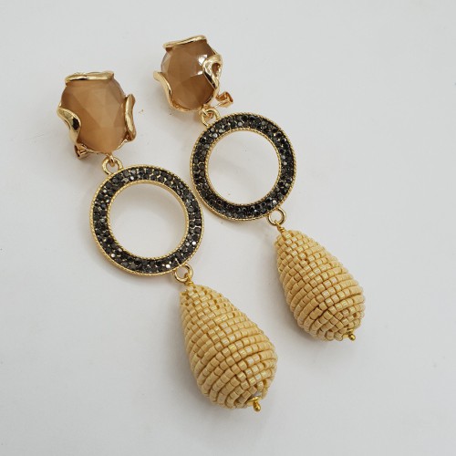 Gilded earrings cat eye and...