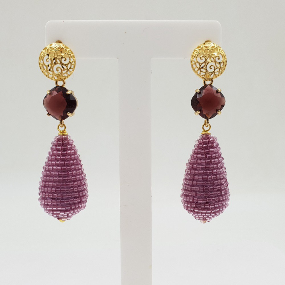 Gilded earrings with crystal and drop of glass beads