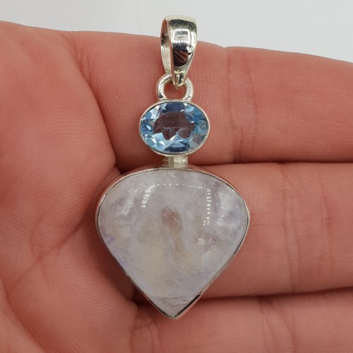 Silver pendant set with moonstone and blue topaz