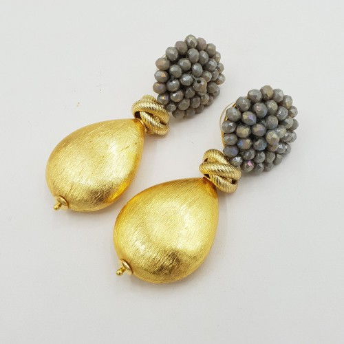 Earrings with brushed golden drop and gray crystals