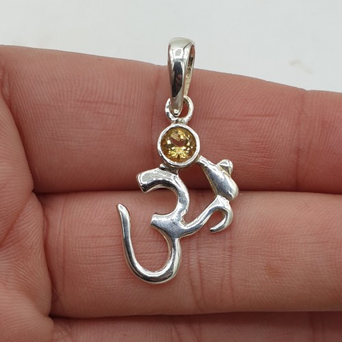 Silver pendant with ohm ticks and citrine