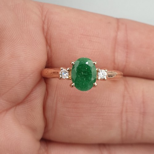 Rosé gilt ring with emerald...