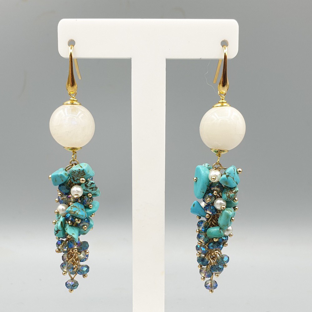 Gilded earrings with moonstone and blue Howliet