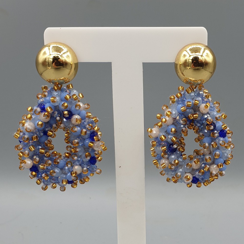 Gilt earrings open drop pendant mixed blue crystals