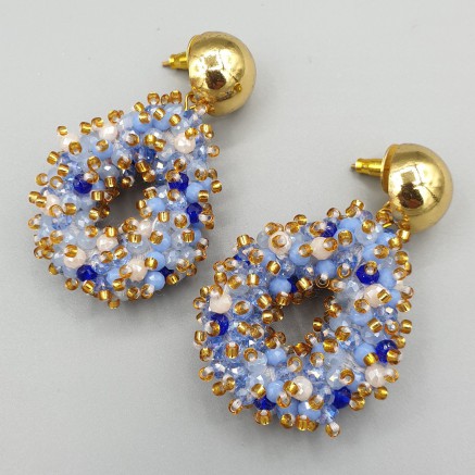 Gilt earrings open drop pendant mixed blue crystals