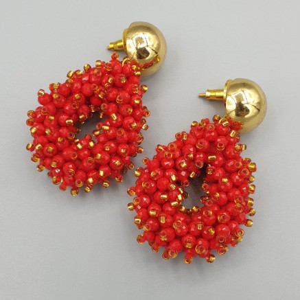 Gilt earrings open drops of red crystals