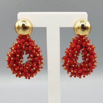 Gilt earrings open drops of red crystals