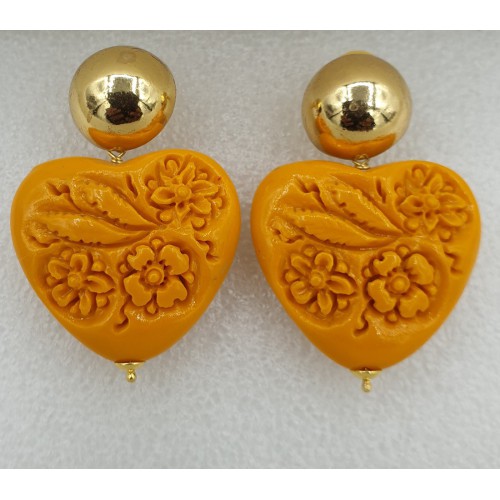 Gilt earrings carved orange...